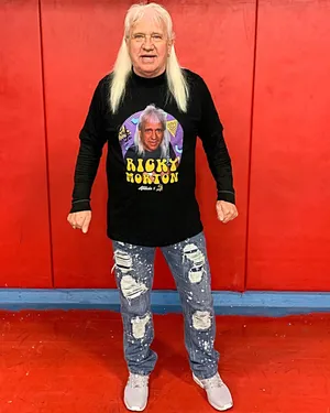 Ricky Morton Wearing Own Merchandise Wallpaper