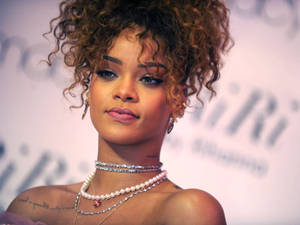 Rihanna At A Riri Event Wallpaper