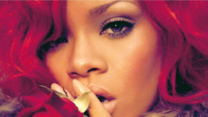 “rihanna Oozing Confidence In Her Signature Red Locks” Wallpaper