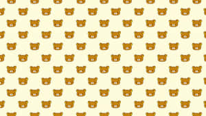 Rilakkuma Sitting Comfortably On A Laptop Wallpaper