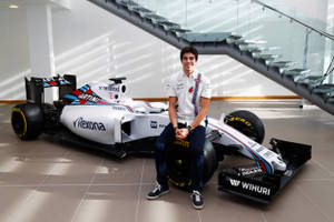 Rising Star Of Formula 1, Lance Stroll In Action Wallpaper