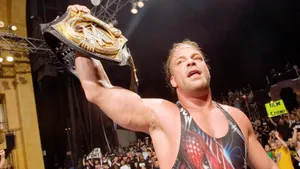 Rob Van Dam Raising Wwe Championship Belt Wallpaper