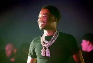 Roddy Ricch Performing On Stage Wallpaper