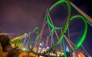 Roller Coaster With High Arching Loops Wallpaper