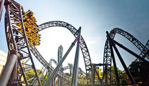 Roller Coaster With Yellow Wagons Wallpaper