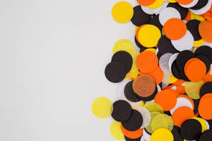 Round Assorted-color Orange, White, And Black Paper Decors Wallpaper