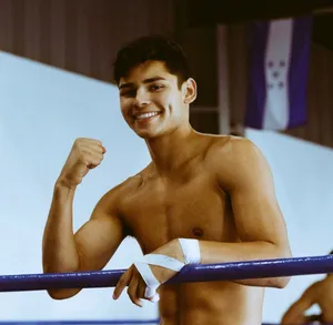 Ryan Garcia Smiling In Gym Wallpaper