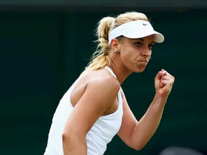 Sabine Lisicki Celebrating Victory With A Fist Pump Wallpaper