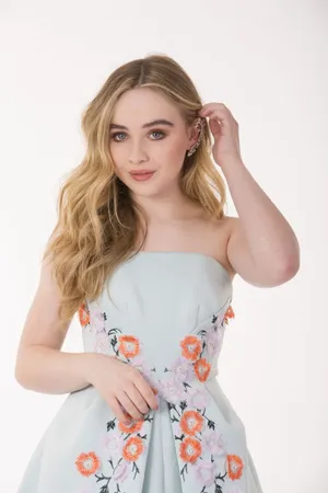 Sabrina Carpenter Floral Dress Portrait Wallpaper