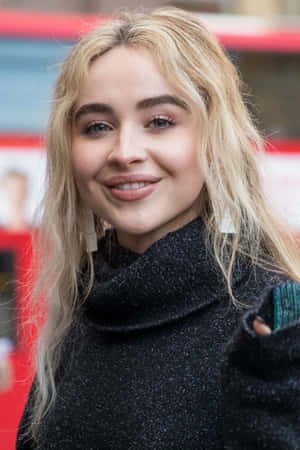 Sabrina Carpenter Smiling Portrait Wallpaper