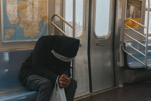 Sad Boy At Subway Wallpaper