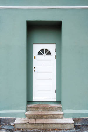 Sage Green Wall And White Door Wallpaper