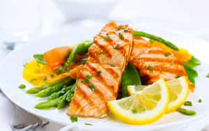 Salmon And Vegetables On A Plate Wallpaper