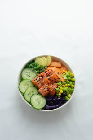 Salmon Cubes In Vegetable Bowl Wallpaper