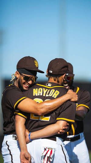 San Diego Padres Ballplayers Fernando Tatis Jr With Teammates Wallpaper