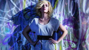 Scarlett Johansson With Blonde Hair On Graffiti Wall Wallpaper