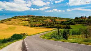 Scenic Country Road On A Steep Hill Wallpaper