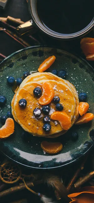 Scrumptious Dessert Display Captured On Iphone Wallpaper