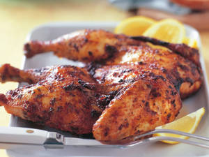 Scrumptious Whole Peri Peri Chicken Feast Wallpaper