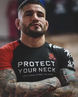 Sean Brady With Crossed Arms Wallpaper