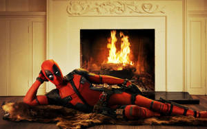 Seductive Deadpool On A Fireplace Wallpaper