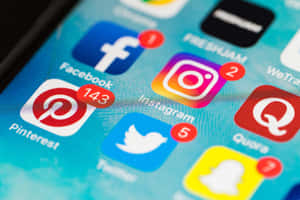 Selective Focus Photograph Of Social Media Apps Wallpaper