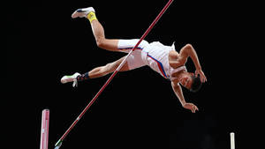 Sensational Ej Obiena Pole Vault Jump Wallpaper