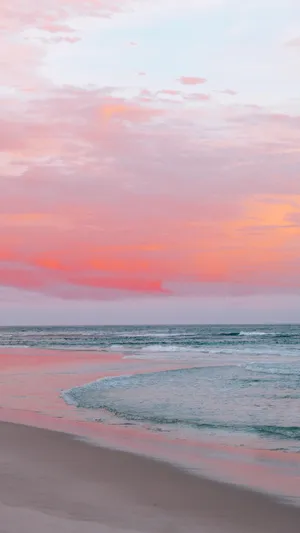 Serene Sunset At Pink Beach Wallpaper