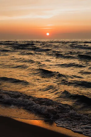 Setting Sun On Beach Android Wallpaper