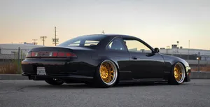 Shine Bright With The Nissan Silvia S14 Wallpaper