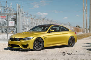 Shiny Gold Bmw M4 Luxury Car Wallpaper