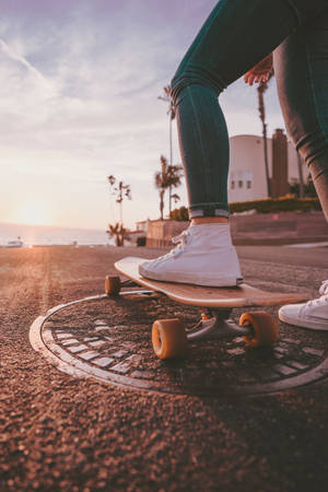 Shoe On Skateboard Skater Aesthetic With Sunbeam Effect Wallpaper