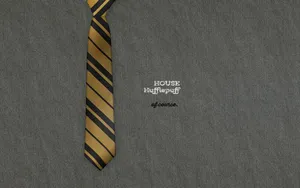 Show Your Colors With Embroidered House Hufflepuff Wallpaper