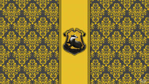 Show Your House Pride With The Hufflepuff Logo Wallpaper