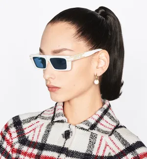 Showcasing Elegance With Dior Signature By Christian Dior Wallpaper