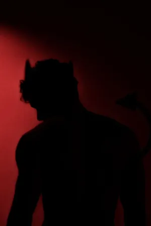 Silhouetteof Demon Figure Wallpaper
