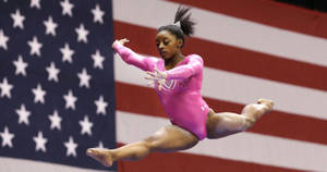 Simone Biles Split Jump Wallpaper