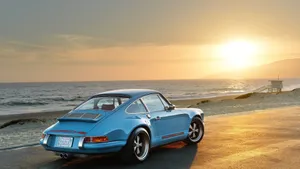 Singer Porsche At Beach Shore Wallpaper