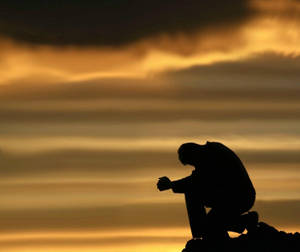 Single Man Kneeling Wallpaper