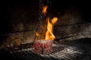 Sizzling Churrasco - Brazilian Barbecue On Flames Wallpaper