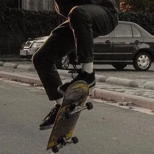 Skater Boy In Action Aesthetic Wallpaper