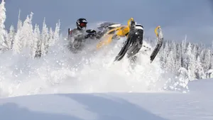 Ski Jumping Using Ski-doo Snowmobiles Wallpaper