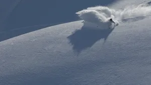 Skiing Ice Surge Wallpaper