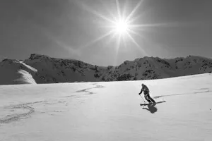 Skiing With Sun Wallpaper