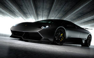 Sleek Black Lamborghini Wallpaper