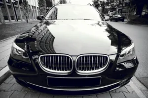 Sleek Black Sedan Closeup Wallpaper