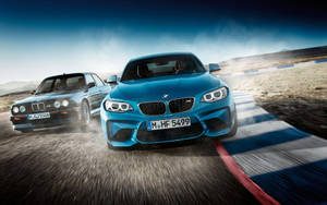 Sleek Blue Bmw Racing On Track Wallpaper