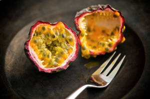 Sliced And Eaten Ripe Passion Fruit Wallpaper