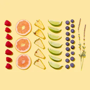 Sliced Fruits On White Surface Wallpaper