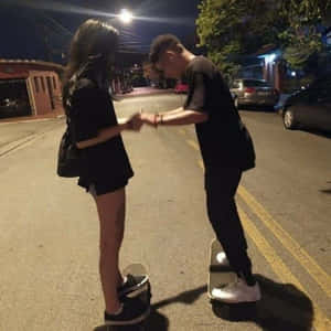 Smiling Boy Wearing A Stylish Striped Shirt Wallpaper
